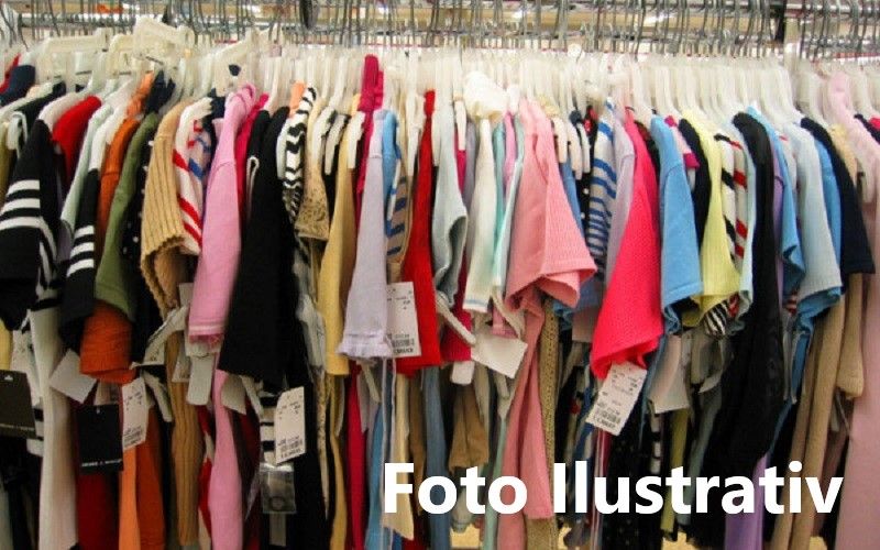 Articole vestimentare contrafăcute confiscate și dosar penal pentru un comerciant din Găești