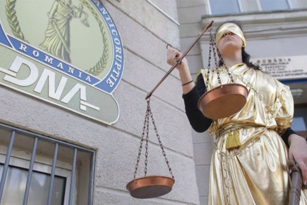 Record! Ofițer de poliție judiciară reținut de DNA, după ce a cerut mită de 1,1 milioane de euro