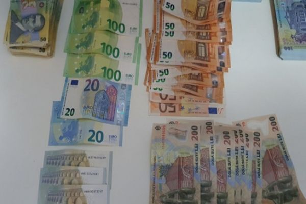 Poliţiştii au confiscat peste 99.000 de lei după 18 percheziţii în Ilfov şi Dâmboviţa  