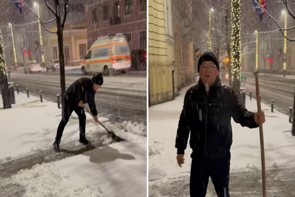 Emil Boc, show cu lopata în fața Primăriei Cluj-Napoca VIDEO