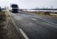 FOTO Drumul spre Autostrada A1, aproape impracticabil din cauza gropilor