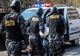 Doi bărbați au fost reținuți de polițiști după ce au furat 20 de butelii